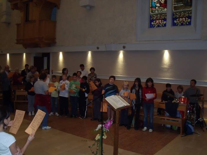 Rptition des chants avant la messe.